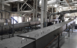 Dried sludge conveyor system 
