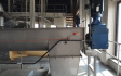 Dried sludge conveyor system 