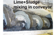 Lime amendment into spiral conveyor train to achieve Class A Sludge